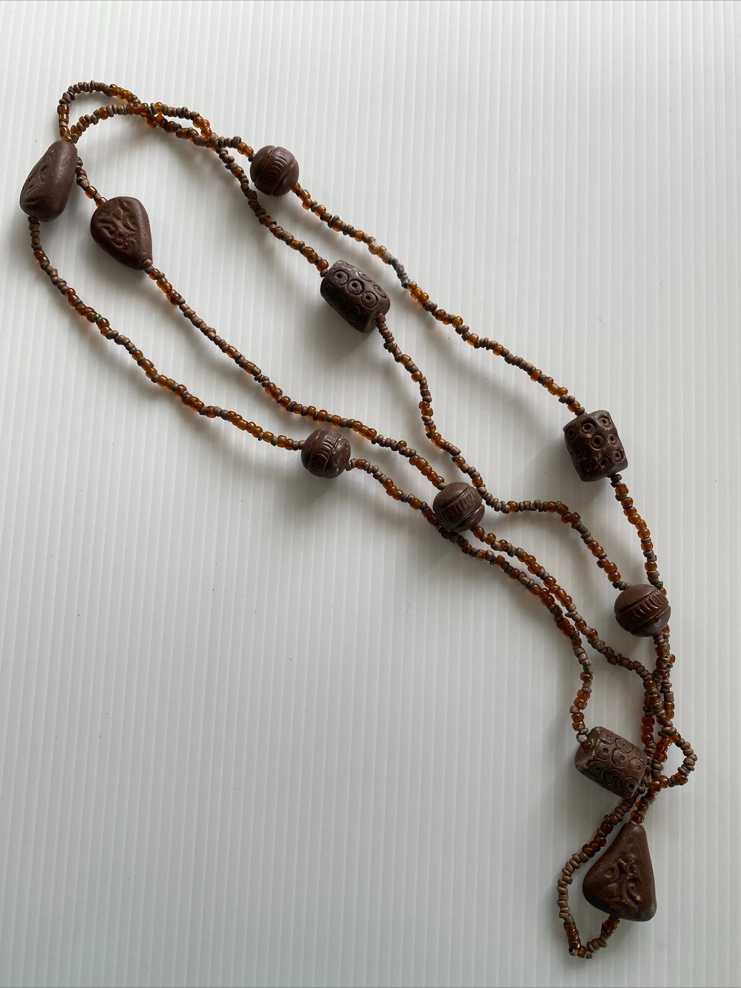 Long Strand Brown Neutral Look Bead Necklace slide over No Clasp wood look