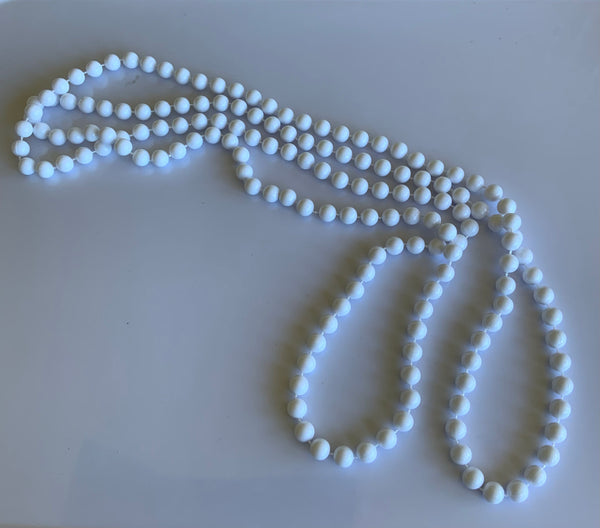 Long Strand White Bead Necklace slide over No Clasp