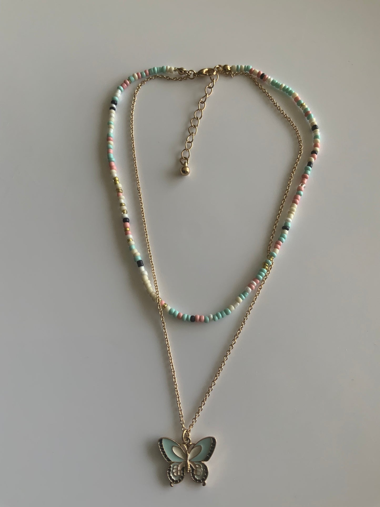 Double Strand Beaded in Pastel Colours  & Chain  Necklace with Butterfly Charm