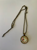 Butterfly & Floral Glass Dome Pendant with Bronzetone Necklace