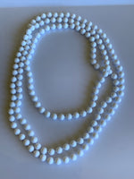 Long Strand White Bead Necklace slide over No Clasp